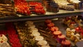 Sweet tasty traditional French pastry in several variations presented in a confectionery shop in the downtown of Paris.