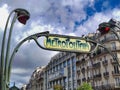Paris, France 8th August 2023: Art Nouveau Metropolitan sign near Pasteur station