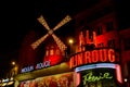 Paris, France 8th August 2023: Moulin Rouge by night in Paris