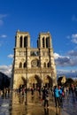 PARIS - Jan 10, 2019: Tourists walking and taking pictures near the Triumphal arch de Triomphe du Carrouse , not far from the Royalty Free Stock Photo