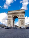 PARIS - Jan 10, 2019: Tourists walking and taking pictures near the Triumphal arch de Triomphe du Carrouse , not far from the Royalty Free Stock Photo