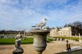 PARIS - January 8, 2016: Bird on the antique outdoor flowerpot i