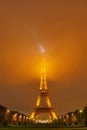 PARIS - JANUARY 1: Eiffel Tower and antique carousel as seen at night on January 1, 2015 in Paris, France. The Eiffel Royalty Free Stock Photo