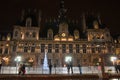 PARIS-JANUARY 9: Paris ice skating rink and illuminated the Hotel de ville at night on January 9,2012 in Paris.