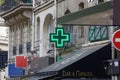 Green cross pharmacy sign in Paris