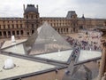 Louvre pyramid entrance to famous museum. Paris. France. June 21, 2012 Royalty Free Stock Photo