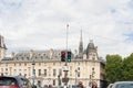Paris law court with red and green traffic light