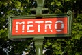 Paris metro entrance sign