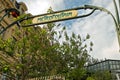 Paris metro entrance sign