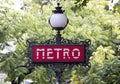 Paris metro sign with tree background Royalty Free Stock Photo