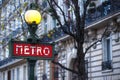 Paris Metropolitain entrance station. A pole with traditional me