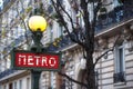 Paris Metropolitain entrance station. A pole with traditional me