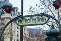 Paris Metropolitain entrance station. A pole with traditional me