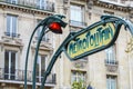 Paris Metropolitain entrance station. A pole with traditional me