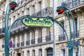 Paris Metropolitain entrance station. A pole with traditional me