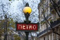 Paris Metropolitain entrance station. A pole with traditional me