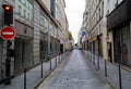 Paris narrow street stretching to the horizon. Beautiful facades of houses Royalty Free Stock Photo