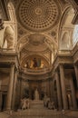 Pantheon inside view with high ceiling, columns, statues and paintings richly decorated in Paris. Royalty Free Stock Photo