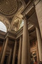 Pantheon inside view with high ceiling, columns, statues and paintings richly decorated in Paris. Royalty Free Stock Photo