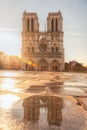 Paris, Notre Dame cathedral with reflection in water against sunrise in France Royalty Free Stock Photo