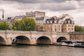 Paris: Pont-Neuf on a cloudy day. side view Royalty Free Stock Photo