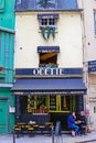 Closeup of old building front of famous traditional vintage patisserie cafe Odette