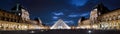 Panoramic view of Louvre at night, Paris, France Royalty Free Stock Photo