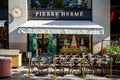 Paris - September 10, 2019 : The Pierre Herme pastry store on Champs-Elysees avenue