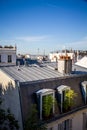 PARIS - September 6, 2019 : Roof of a Haussmann building and tour eiffel view from the Montmartre hill Royalty Free Stock Photo