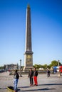 PARIS - September 10, 2019 : Tourists taking pictures in front of the Obelisk of Luxor, Concorde square