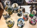 Paris specific snow globes display in Galeries Lafayette, Paris, France