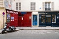 Paris Street Scene with Restaurant and Scooter