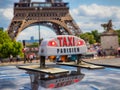 Paris taxi near Eiffel Tower Royalty Free Stock Photo