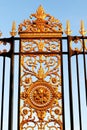 Paris Tuileries gold leaf grille with ornaments surrounding the garden