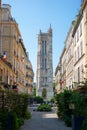 Paris typical street and Saint-Jacques flamboyant gothic tower