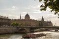 A paris vista with historic buildings and Seine river
