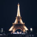 wonderful Eiffel Tower glows against the night sky. Tourist attractions in Europe and the World