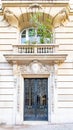 Paris, a wooden door, typical building