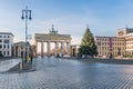 Pariser Platz with the Brandenburg Gate, Hanukkah candlestick and Christmas tree in Berlin, Germany Royalty Free Stock Photo