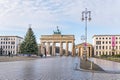 Pariser Platz with the Brandenburg Gate, Hanukkah candlestick and Christmas tree in Berlin, Germany