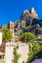 Parish Church With Cliff Behind-Moustiers St Marie Royalty Free Stock Photo