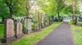 Cemetery near Parish Church of St Cuthbert in the Princes Street Gardens in a sunny summer afternoon. Edinburgh, Scotland Royalty Free Stock Photo