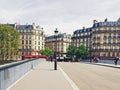 Parisian architecture and historical buildings, restaurants and boutique stores on streets of Paris, France Royalty Free Stock Photo