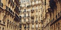 Parisian architecture and historical buildings, restaurants and boutique stores on streets of Paris, France