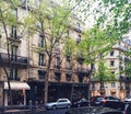 Parisian architecture and historical buildings, restaurants and boutique stores on streets of Paris, France