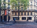 Parisian architecture and historical buildings, restaurants and boutique stores on streets of Paris, France Royalty Free Stock Photo