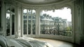 Parisian bedroom, arched window, city view, sunlight, luxury Royalty Free Stock Photo
