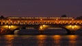 Parisian bridge during the night.