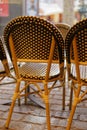 Parisian cafe chairs on terrace during autumn in street montmartre street Royalty Free Stock Photo