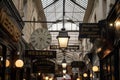 Parisian covered passage, passage des panoramas with typical retro signs of shops and boutiques.